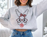 "Easter Bunny Bubblegum" design on an ash gray unisex crewneck sweatshirt