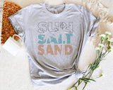 "Sun Salt Sand" design on a heather gray unisex t-shirt