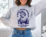 "A Well Read Woman" design on an ash gray unisex crewneck sweatshirt