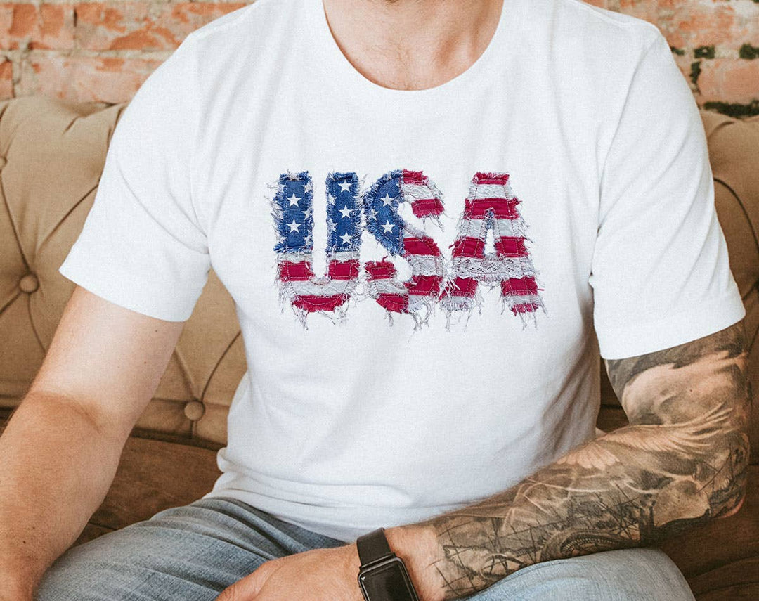 "USA Faux Patchwork American Flag" design on a white unisex t-shirt