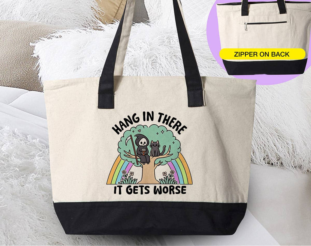 "Hang In There, It Gets Worse" design on a natural canvas zippered tote bag