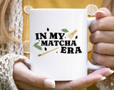 "In My Matcha Era" design on a white ceramic coffee mug