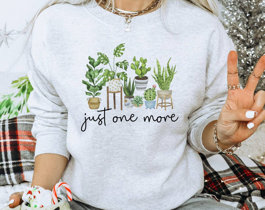 "Just One More Plant" design on an ash gray unisex crewneck sweatshirt