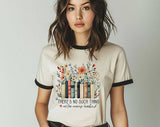"There's No Such Thing As Too Many Books" design on a natural ringer t-shirt with black contrast trim