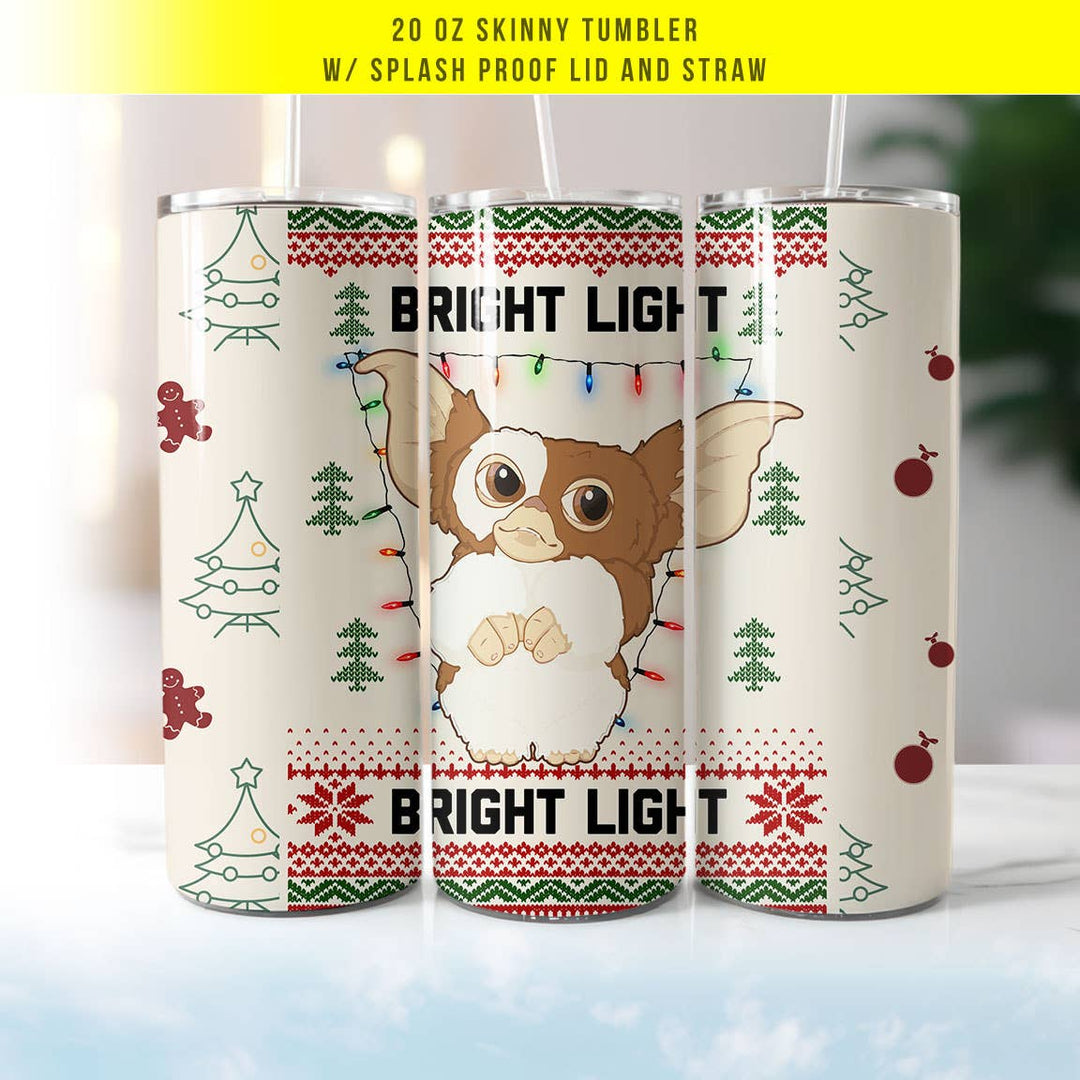 "Bright Light Gizmo Gremlins" design on a 20 oz skinny tumbler with lid and straw