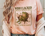 "Wish I Lacked Critical Thinking Frog" design on a peach unisex t-shirt