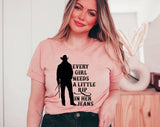 "Every Girl Needs A Little Rip In Her Jeans" design on a peach unisex t-shirt