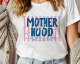 "Motherhood, Some Days I Rock It" design on a white unisex t-shirt