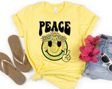 "Peace Summer Flower Smiley" design on a pale yellow unisex t-shirt
