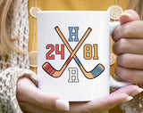 "Heated Rivalry Inspired 24 81 Hockey" design on a white ceramic coffee mug