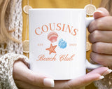 "Cousins Beach Club" design on a white ceramic coffee mug