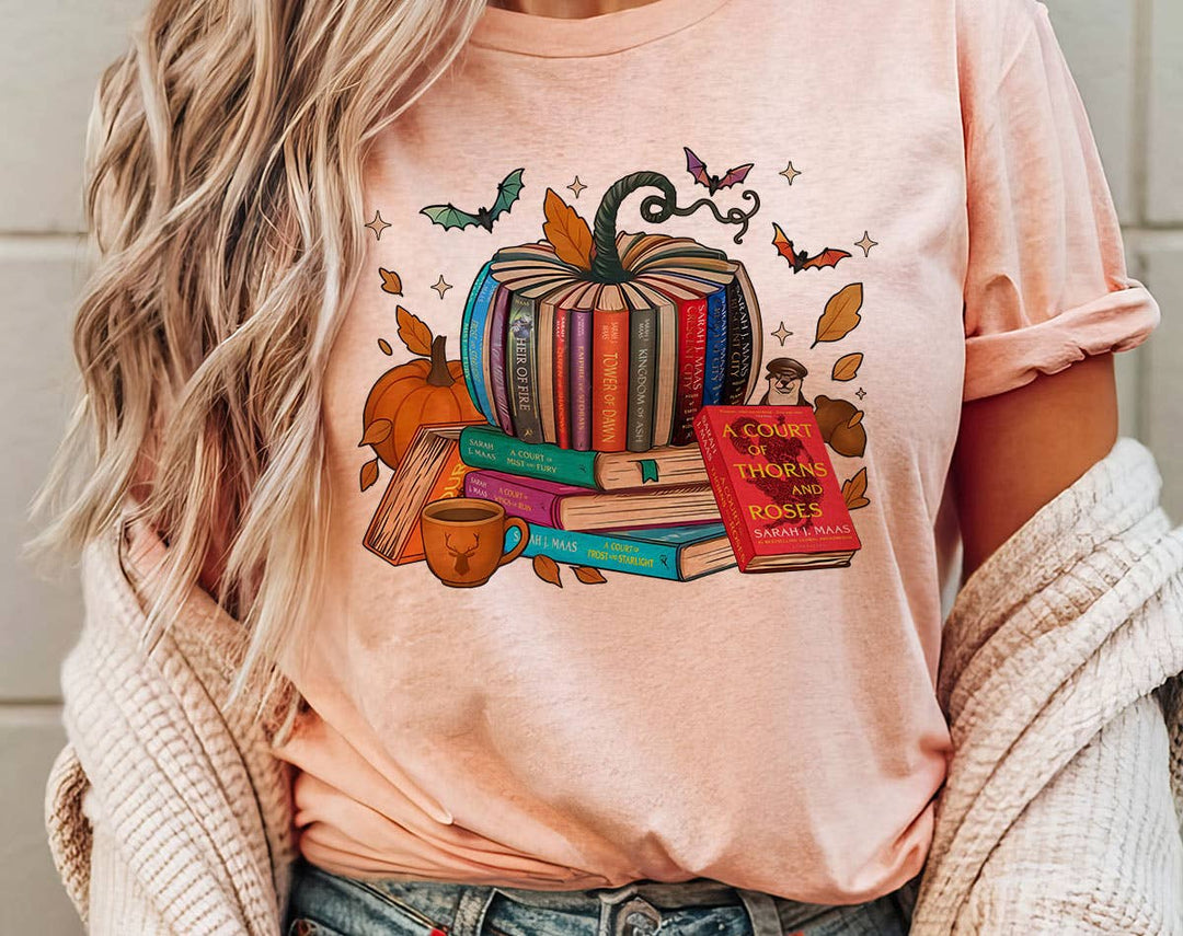 "A Court Of Roses Pumpkin Book" design on a peach unisex t-shirt