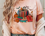 "A Court Of Roses Pumpkin Book" design on a peach unisex t-shirt