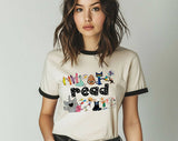 "Read Kids Book Characters" design on a natural ringer t-shirt with black contrast trim