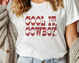 "Cool It Cowboy" design on a white unisex t-shirt
