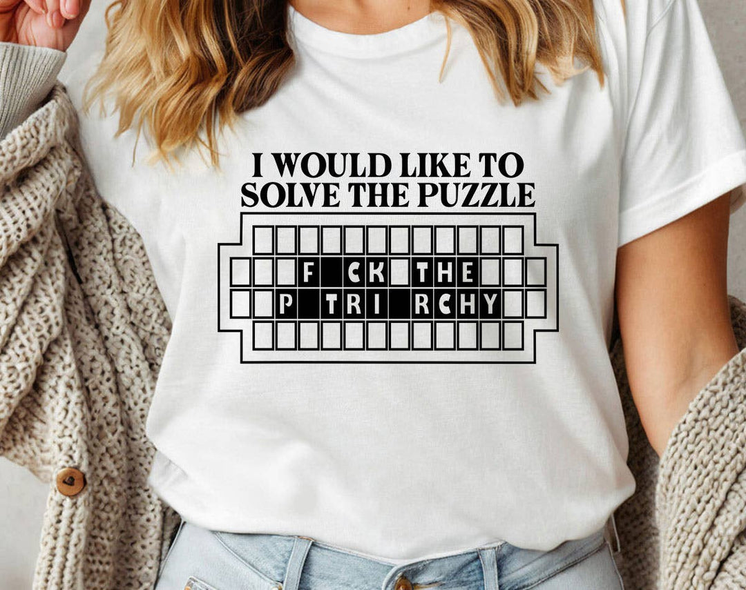 "Solve The Puzzle F*ck The Patriarchy" design on a white unisex t-shirt