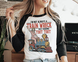 "I'm Not Always A Train Wreck" design on a white baseball raglan tee with black sleeves