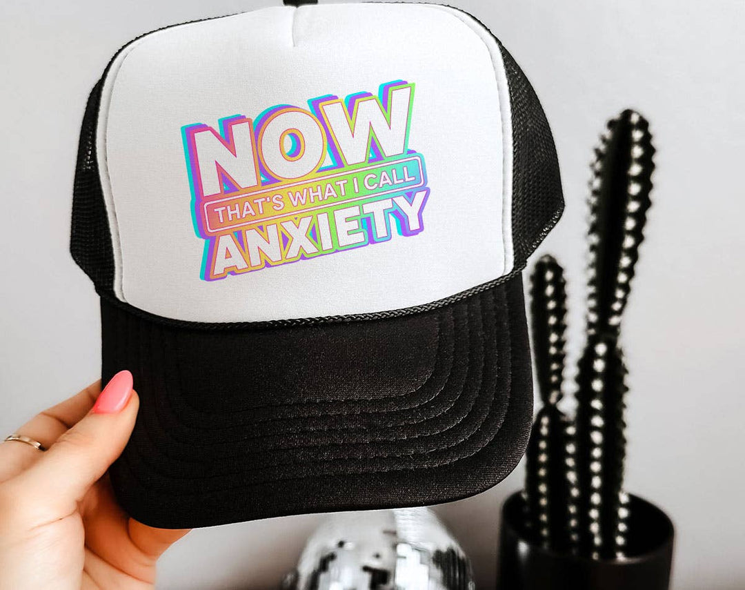 "Now That's What I Call Anxiety" design on a mesh-back snapback trucker hat