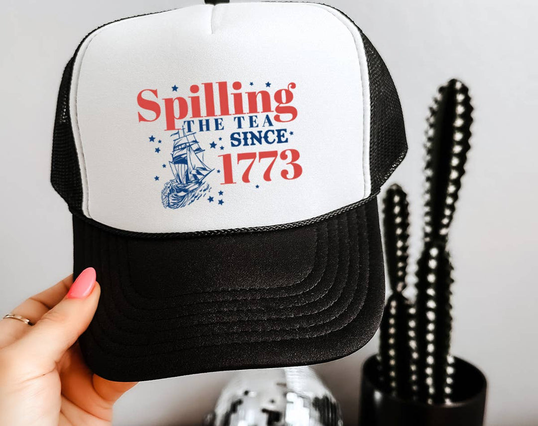 "Spilling The Tea Since 1773" design on a mesh-back snapback trucker hat