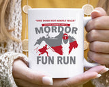 "Mordor Fun Run" design on a white ceramic coffee mug