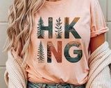 "Hiking Tree Nature Drawing" design on a peach unisex t-shirt