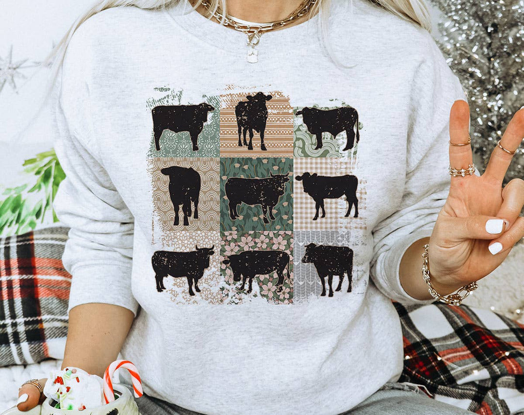 "Cow Boho Retro" design on an ash gray unisex crewneck sweatshirt