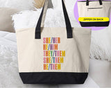 "Pride Pronouns" design on a natural canvas zippered tote bag