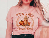 "Pumpkin Spice Social Club" design on a peach unisex t-shirt