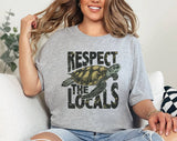 "Respect The Locals Sea Turtles" design on a heather gray unisex t-shirt