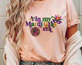 "In My Mardi Gras Era" design on a peach unisex t-shirt