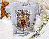 "Nashville Country Music City" design on a heather gray unisex t-shirt
