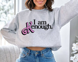"I Am Kenough" design on an ash gray unisex crewneck sweatshirt