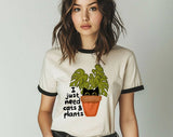"I Just Need Cats And Plants" design on a natural ringer t-shirt with black contrast trim