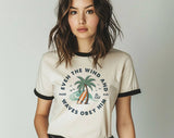 "Even The Wind & Waves Obey Him" design on a natural ringer t-shirt with black contrast trim