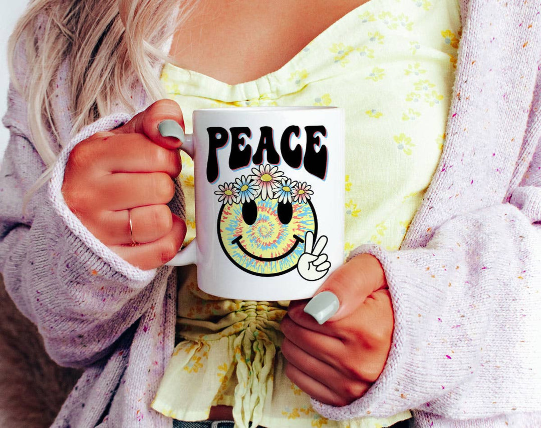 "Peace Flower Happy Face" design on a white ceramic coffee mug