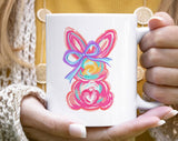 "Easter Bunny Brushstrokes" design on a white ceramic coffee mug
