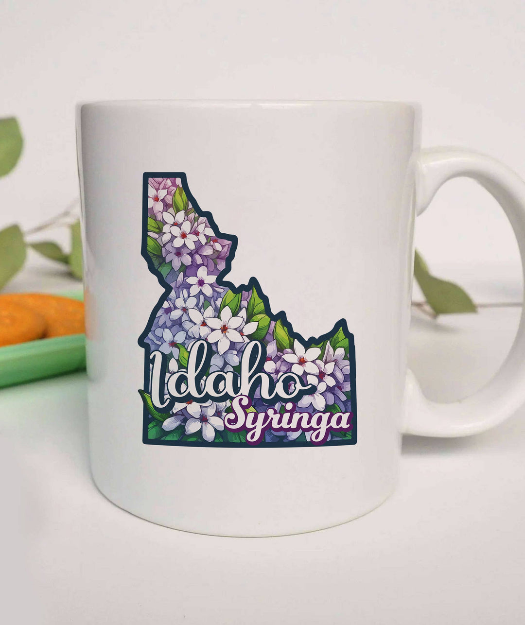 "Idaho State Flower Syringa" design on a white ceramic coffee mug