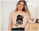 "Mom-ster Leopard Bun" design on a peach unisex t-shirt