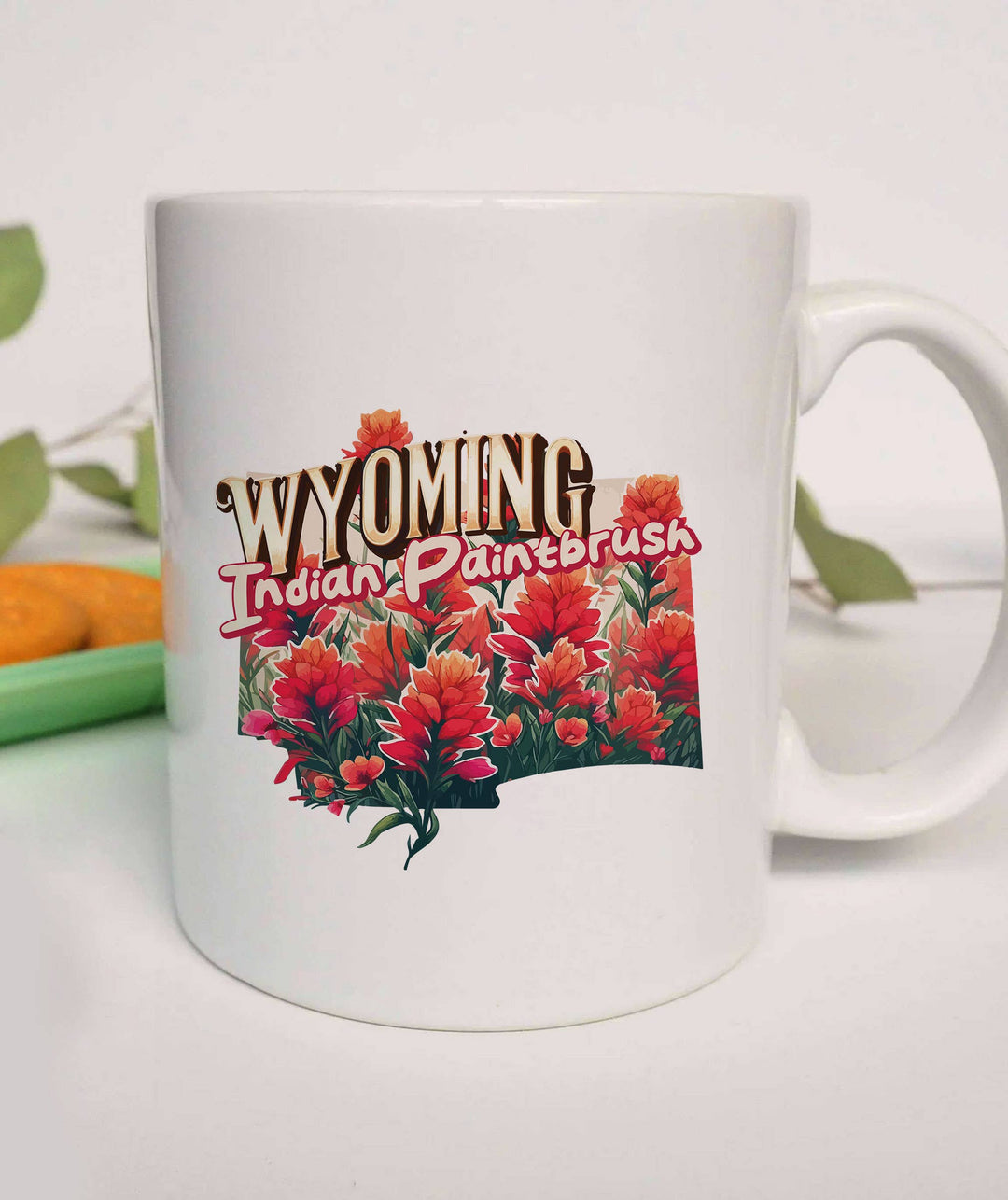 "Wyoming State Flower Indian Paintbrush" design on a white ceramic coffee mug
