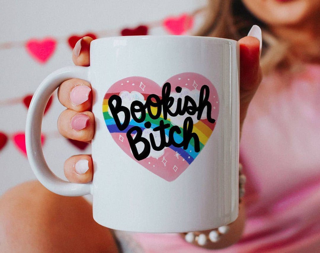 "Bookish Bitch" design on a white ceramic coffee mug