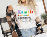 "Kamala Hard To Pronounce, Try Madam President" design on a white unisex t-shirt