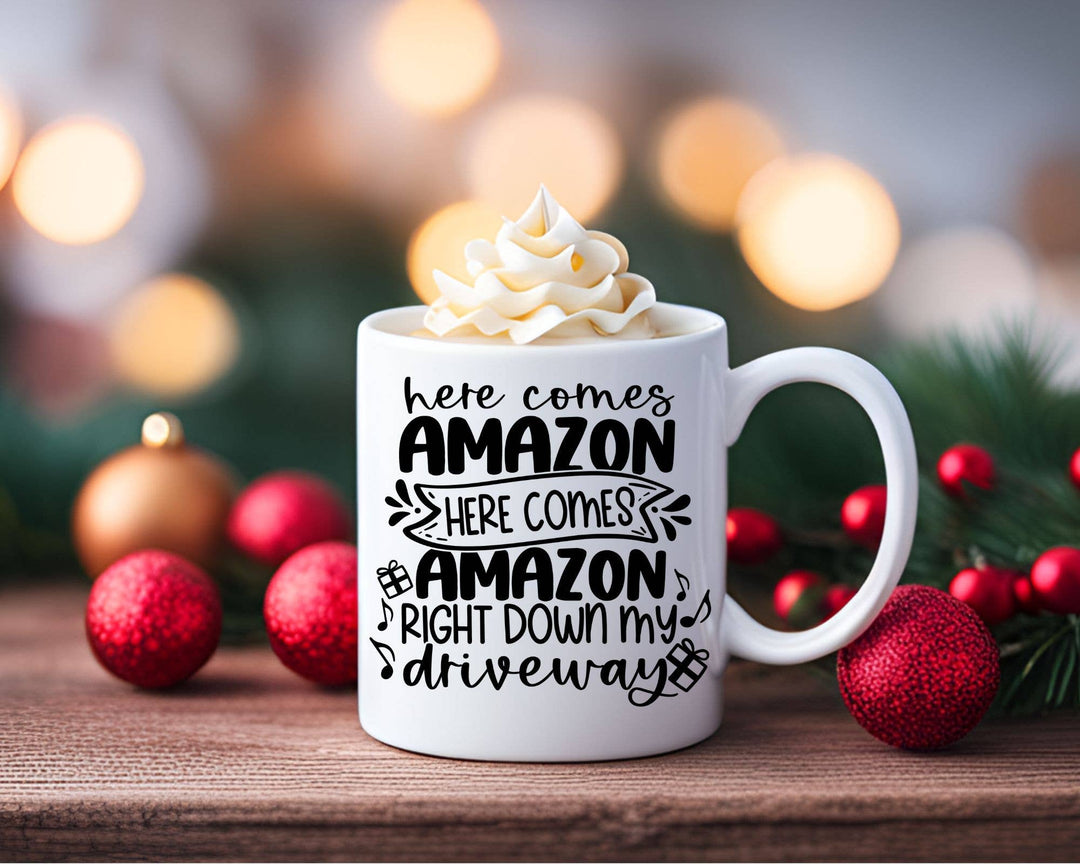 "Here Comes Amazon" Christmas design on a white coffee mug