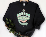 "Luckys Irish Lodge" design, alternate view, on an ash gray unisex crewneck sweatshirt