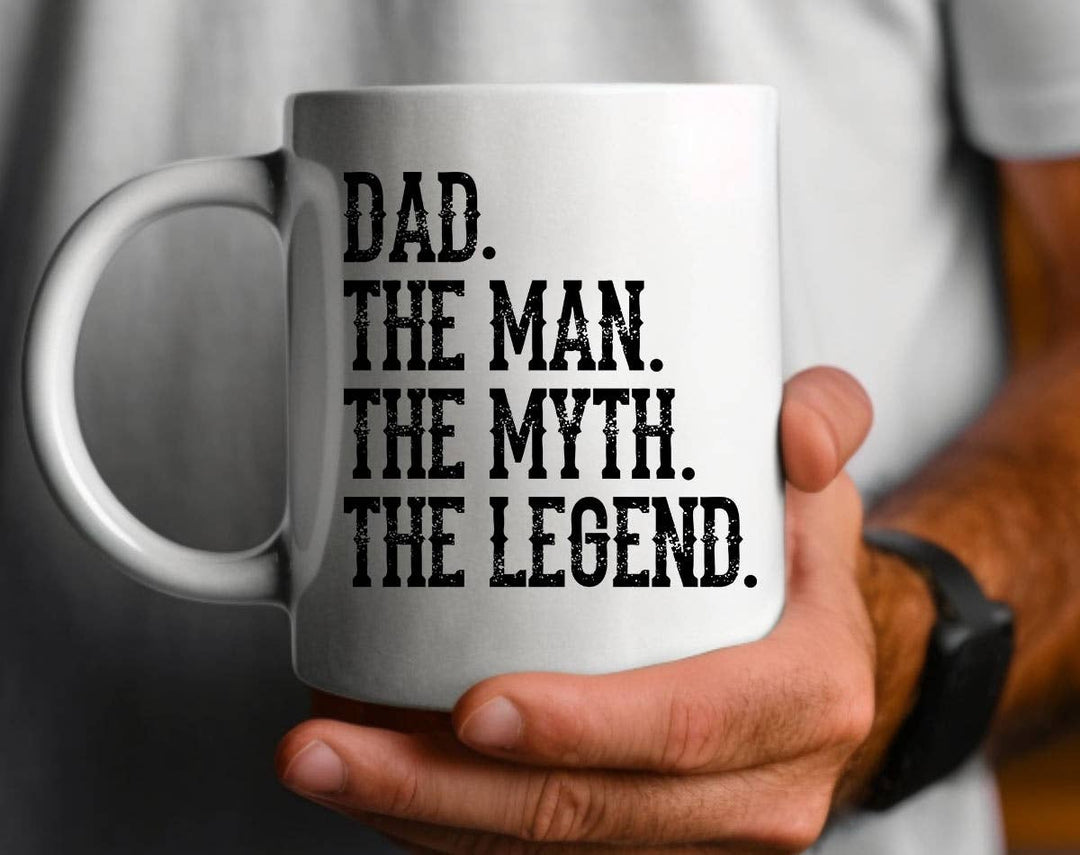 "Dad The Man They Myth Legend" design on a white ceramic coffee mug