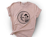 "Magic Mushroom" design on a peach unisex t-shirt
