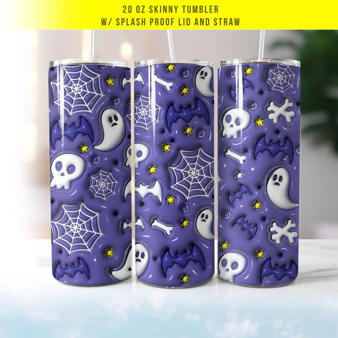"Cute Skulls and Ghosts Puff" design on a 20 oz skinny tumbler with lid and straw