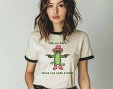 "Call Me Darn Cause I've Been Tootin" design on a natural ringer t-shirt with black contrast trim