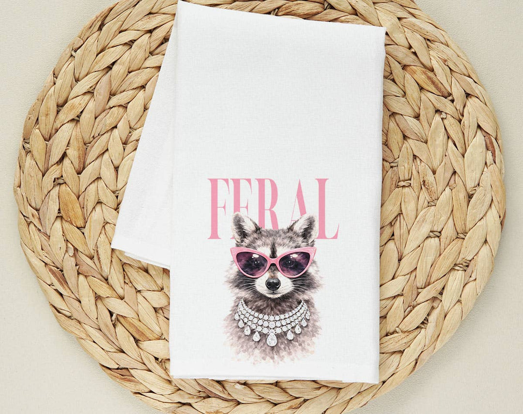 "Feral Vogue Raccoon" design on a white 28 x 28 inch flour sack tea towel