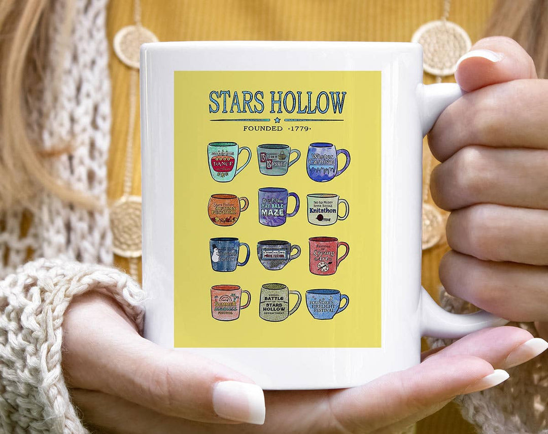 "Star Hollow Coffee Cups" fall design on a white coffee mug