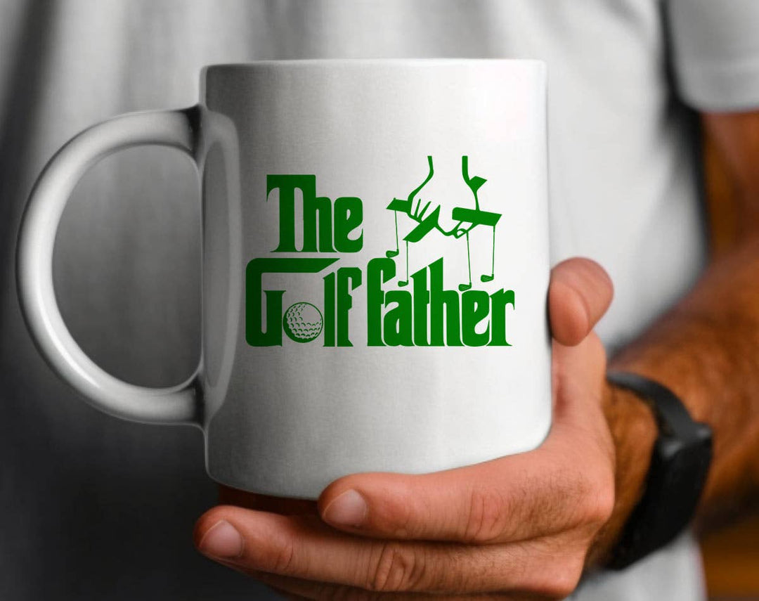 "The Golf Father GREEN" design on a white ceramic coffee mug